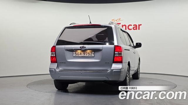 Kia Carnival New Carnival GLX Standard — пробег 105 057 км — фото 4 из 5
