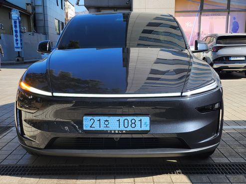 Tesla Model Y Premium RWD — пробег 1 390 км — фото 1 из 5