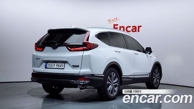 Honda CR-V 2.0 Hybrid Touring 4WD — пробег 23 113 км — фото 2 из 5