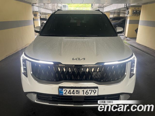 Kia Carnival HEV 9 seater Prestige — пробег 1 800 км — фото 1 из 5