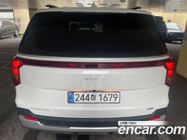 Kia Carnival HEV 9 seater Prestige — пробег 1 800 км — фото 2 из 5