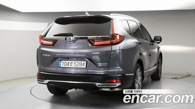 Honda CR-V 2.0 Hybrid Touring 4WD — пробег 66 215 км — фото 4 из 5