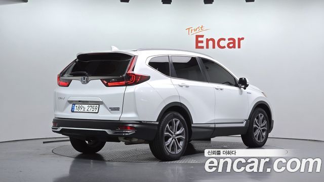 Honda CR-V 2.0 Hybrid Touring 4WD — пробег 55 299 км — фото 2 из 5